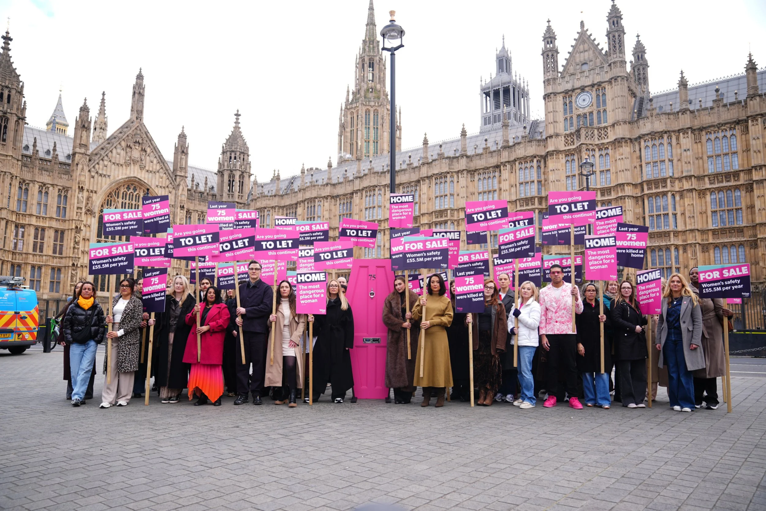 David Morrissey (4th from left), Georgia Harrison (6th from left) and Zara McDermott (centre) take part in the 'Home Is Where The Hurt Is' campaign, organised by the domestic abuse charity Refuge, in Old Palace Yard, Westminster, London. The campaign aims to raise awareness of the dangers women face behind closed doors. Picture date: Tuesday March 10, 2026. PA Photo. Photo credit should read: James Manning/PA Wire