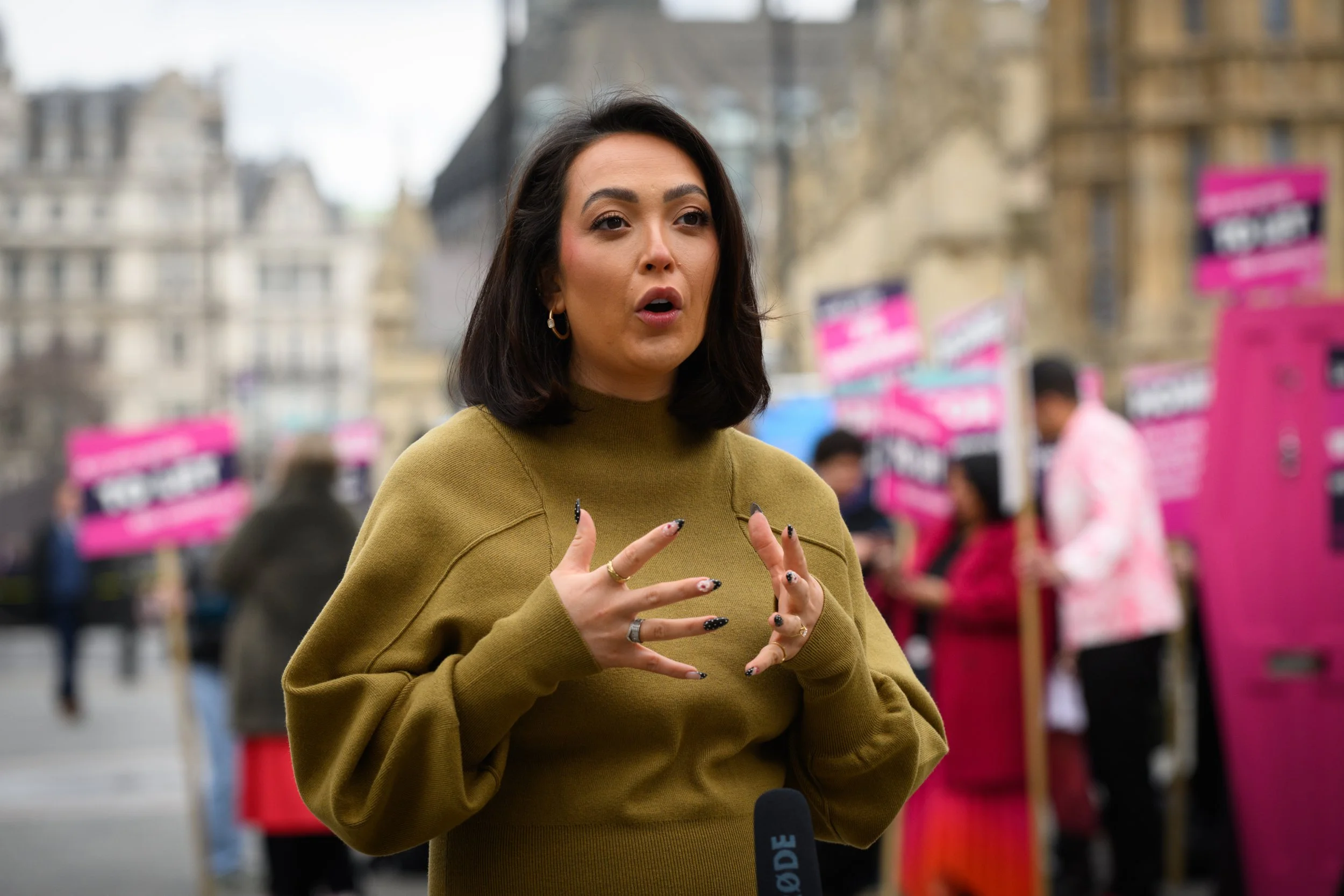 London, UK, 10th March 2026: Refuge brings their ???Home is Where the Hurt is??? campaign to government today. Campaigners armed with placards and a coffin-shaped front door protest outside The Houses of Parliament.
