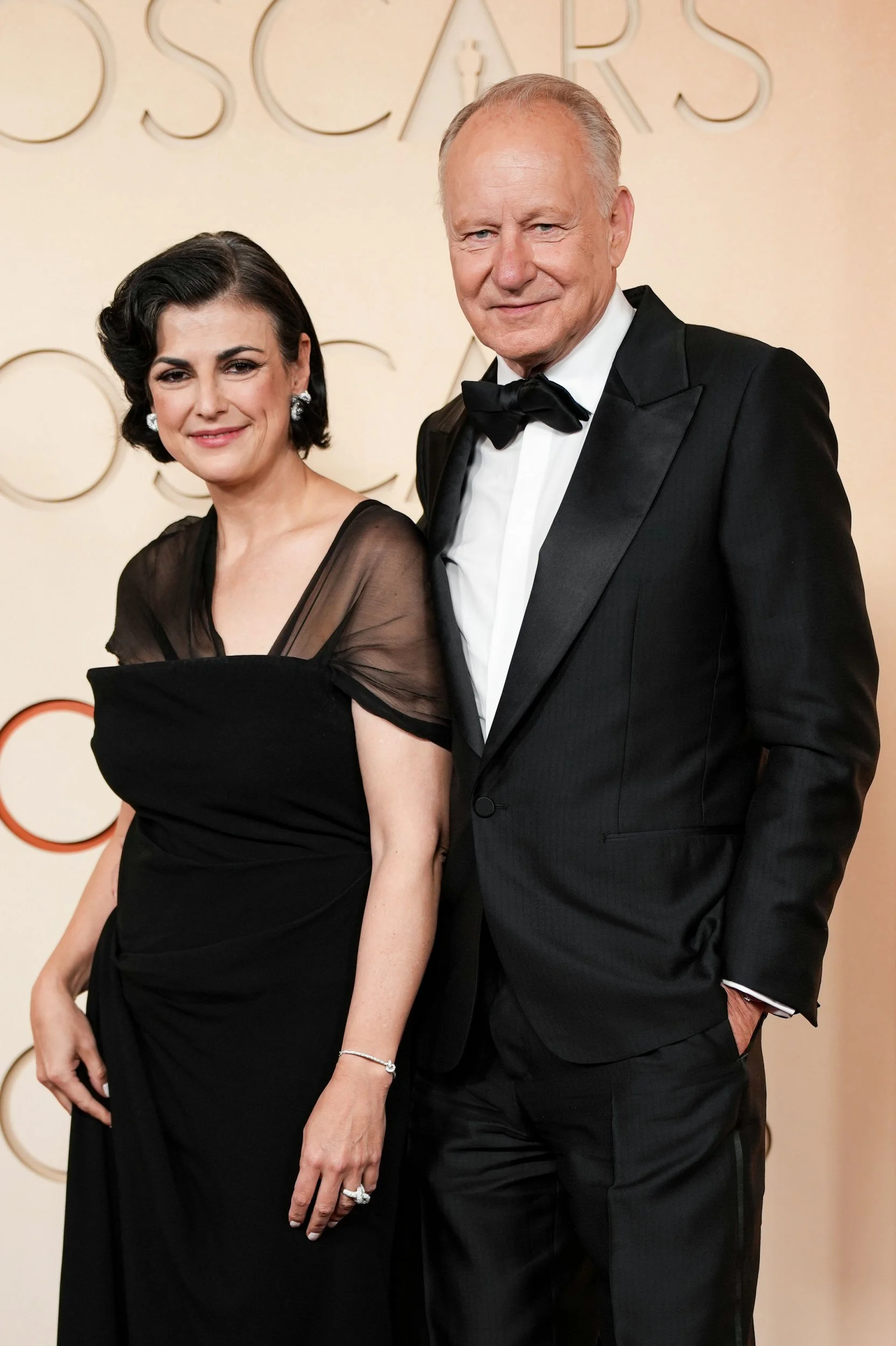 Mandatory Credit: Photo by Shutterstock (16737594ud) Megan Everett-Skarsg?rd and Stellan Skarsg?rd 98th Annual Academy Awards, Arrivals, Los Angeles, California, USA - 15 Mar 2026